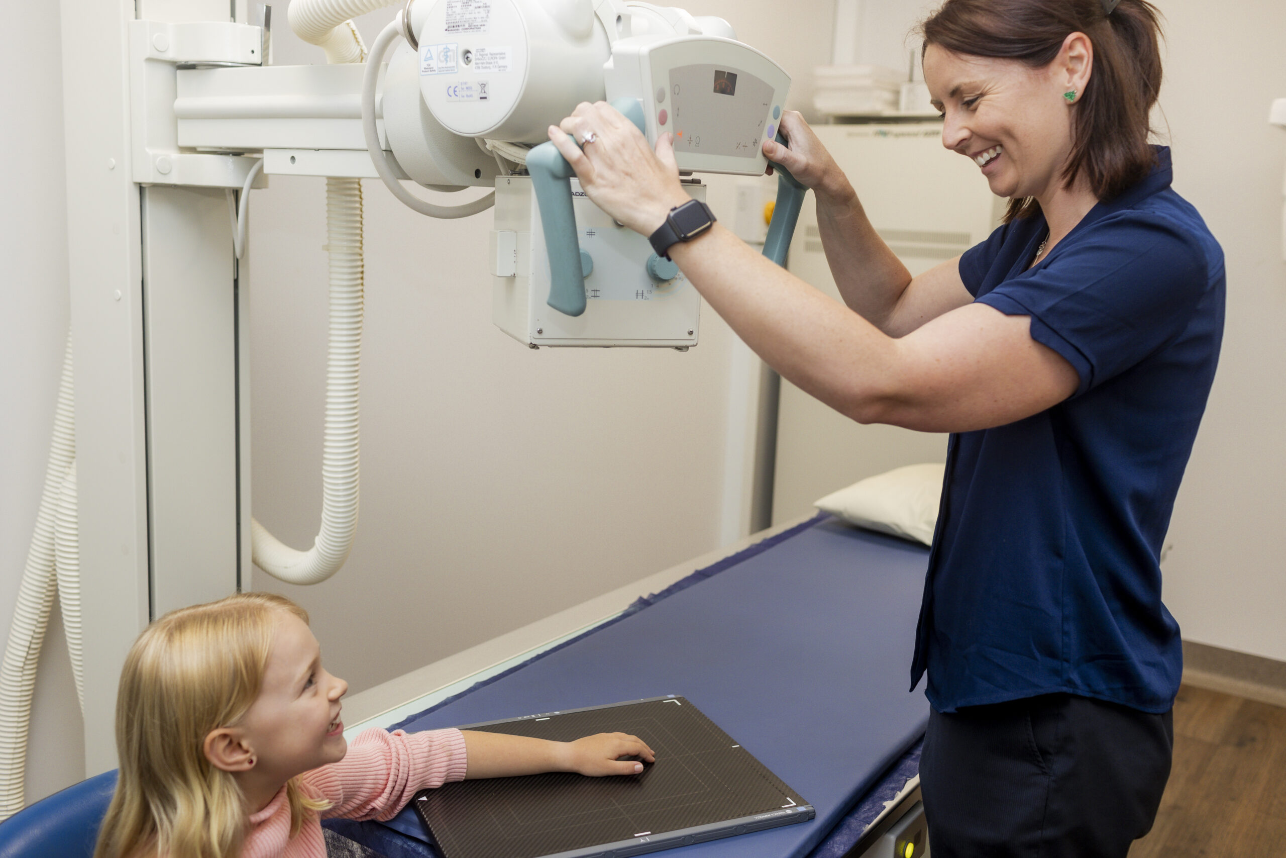 Child undergoing an x-ray.